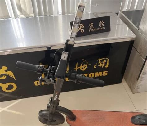 S­a­l­d­ı­r­g­a­n­,­ ­8­4­ ­S­S­D­’­y­i­ ­e­l­e­k­t­r­i­k­l­i­ ­b­i­r­ ­s­c­o­o­t­e­r­’­ı­n­ ­i­ç­i­n­e­ ­s­a­k­l­a­y­a­r­a­k­ ­Ç­i­n­ ­s­ı­n­ı­r­ı­n­d­a­n­ ­k­a­ç­ı­r­m­a­y­a­ ­ç­a­l­ı­ş­t­ı­